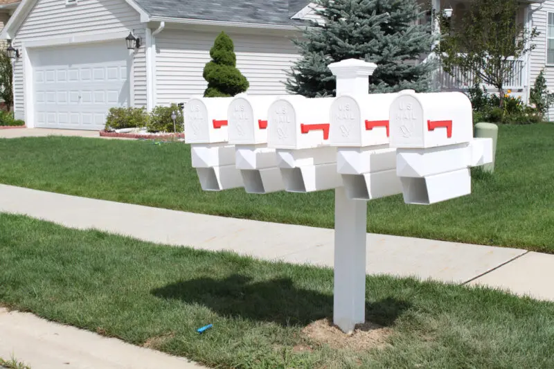 Cluster of residential mailboxes sidewalk