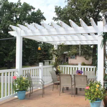 Outdoor patio with white pergola