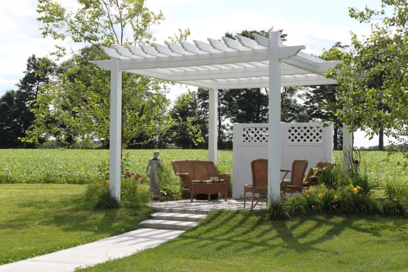 Outdoor pergola with wicker furniture