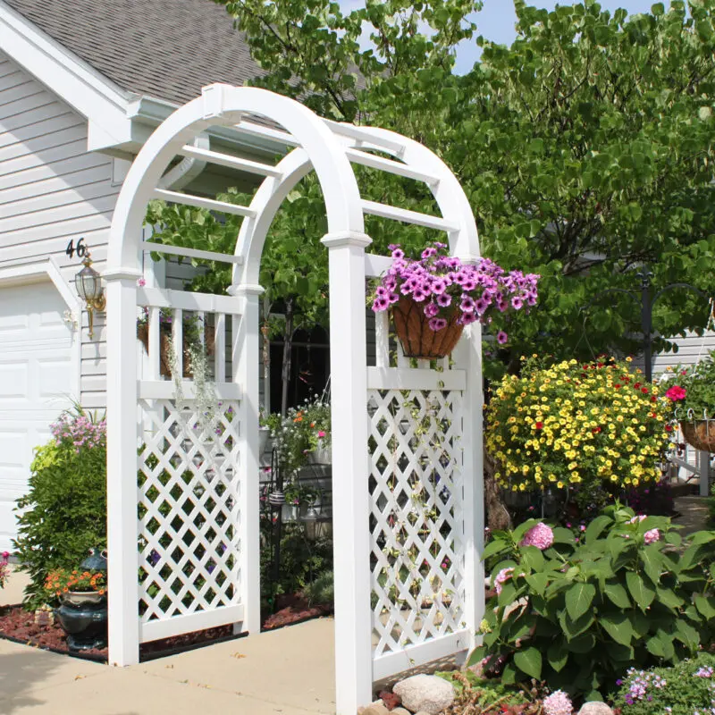 White garden arbor with flowers