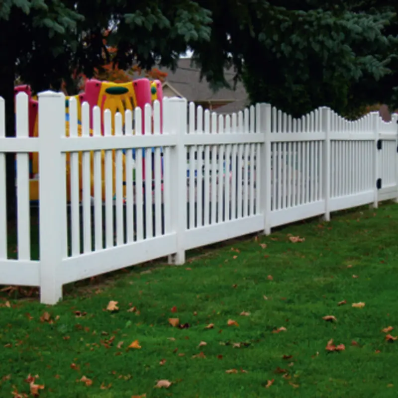 White picket fence grassy yard