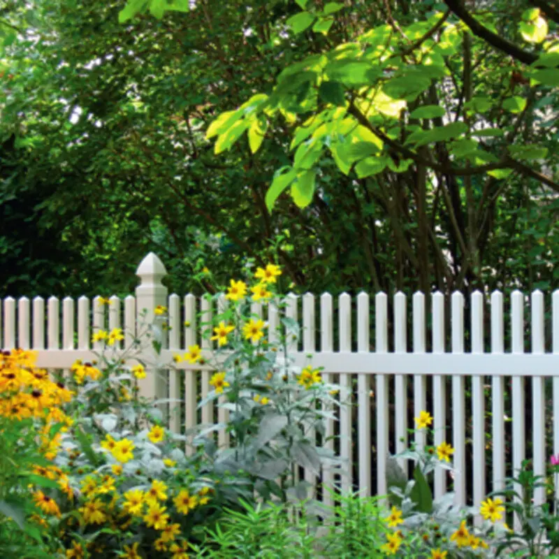 White picket fence garden flowers