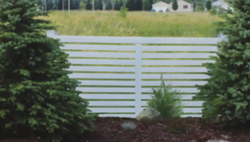White horizontal slat fence outdoors