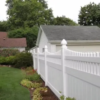 White vinyl fence residential yard