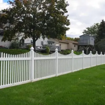 White picket fence residential yard
