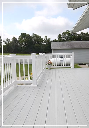 Spacious deck with white railings