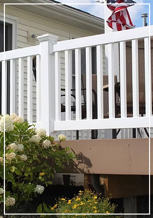 White deck railing with flowers