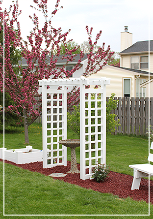 White garden arbor with trellis