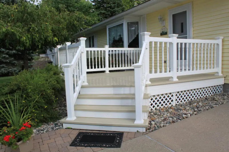 White deck with railing installation