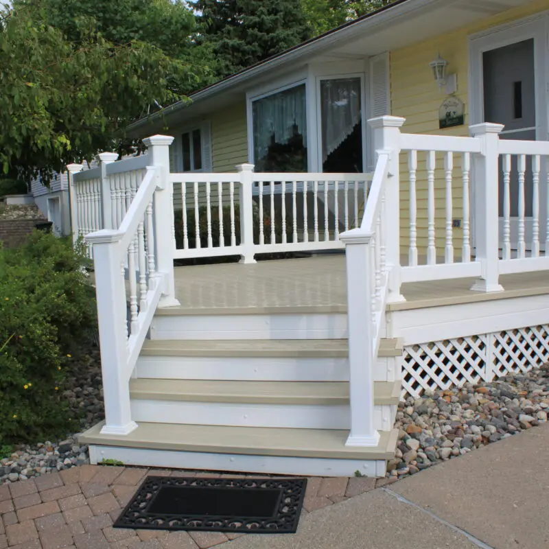 White deck with railing installation