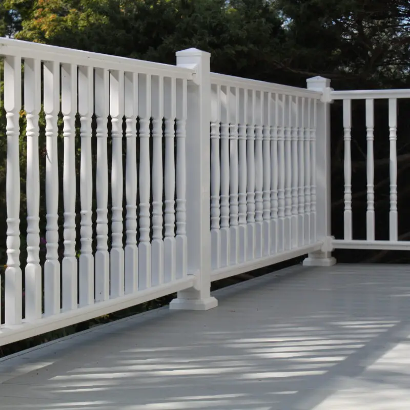 White vinyl deck railing installation