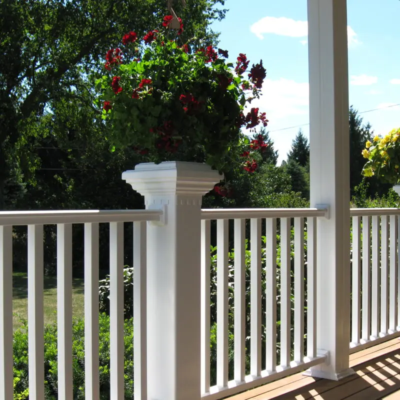 White deck railing with flowers