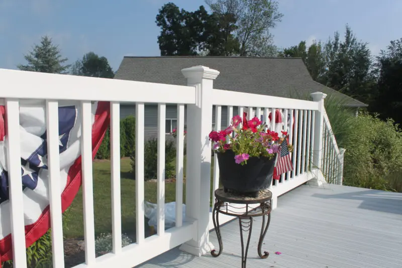White railing with vibrant deck
