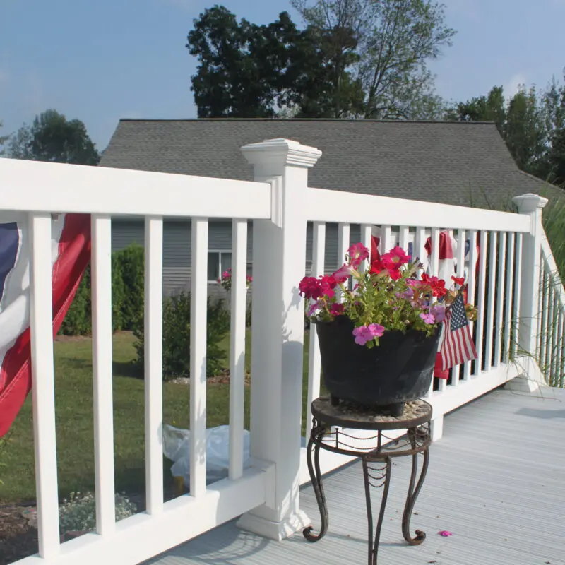 White railing with vibrant deck
