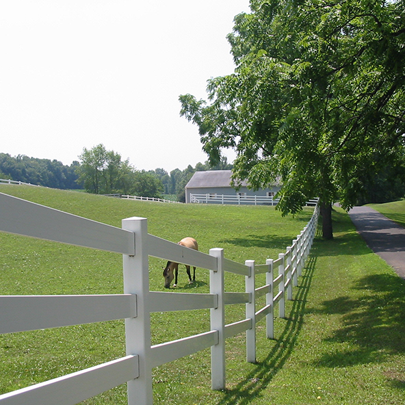 White vinyl farm fence landscape