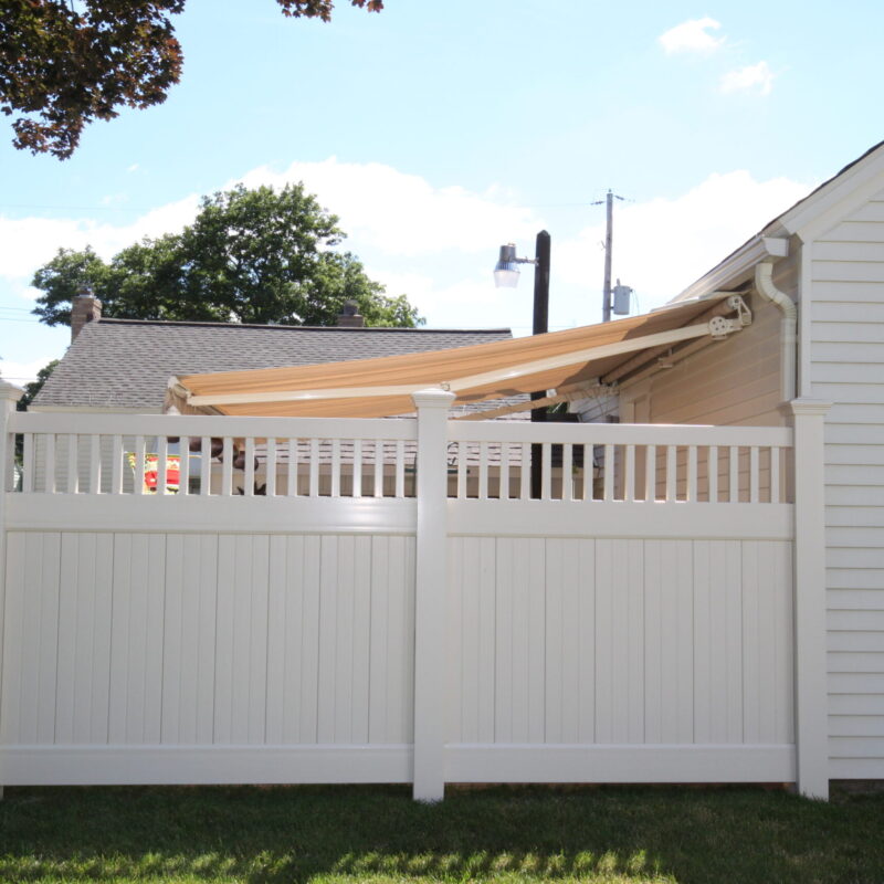 White privacy fence with awning